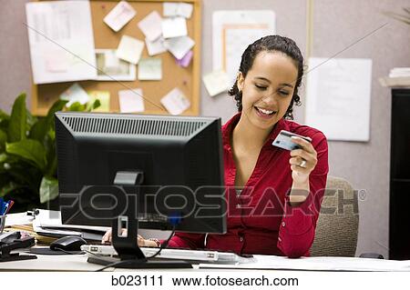woman making an online purchase View Large Photo Image Stock Image - woman making an online purchase. Fotosearch
