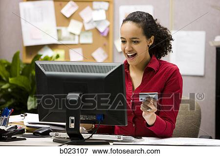 woman making an online purchase View Large Photo Image Stock Photo - woman making an online purchase. Fotosearch