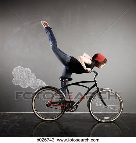 woman on a bicycle View Large Photo Image Stock Image - woman on a bicycle. Fotosearch