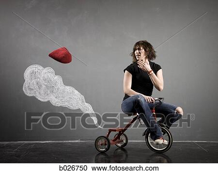 woman on a tricycle View Large Photo Image Stock Image - woman on a tricycle. Fotosearch