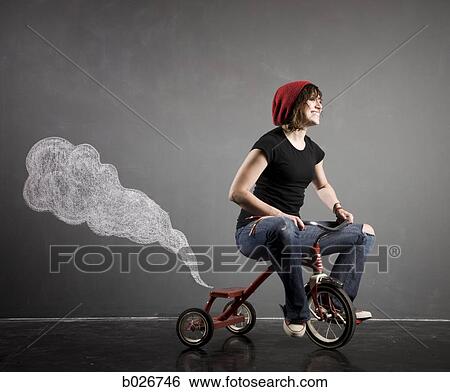 woman on a tricycle View Large Photo Image Stock Photograph - woman on a tricycle. Fotosearch