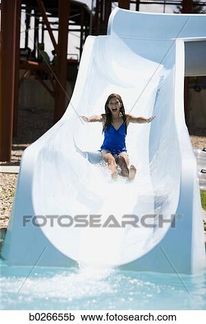 woman on a water slide View Large Photo Image Stock Image - woman on a water slide. Fotosearch
