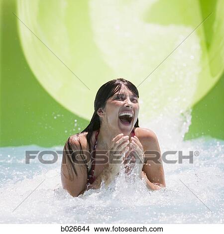 woman on a waterslide View Large Photo Image Picture - woman on a waterslide. Fotosearch