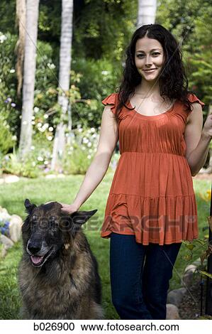 woman outdoors with her dog View Large Photo Image Stock Image - woman outdoors with her dog. Fotosearch