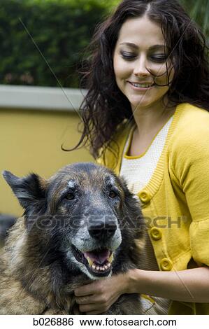 woman outdoors with her dog View Large Photo Image Stock Photograph - woman outdoors with her dog. Fotosearch