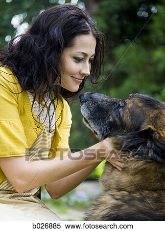 woman outdoors with her dog View Large Photo Image Stock Photography - woman outdoors with her dog. Fotosearch