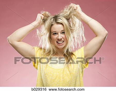 woman pulling out her hair View Large Photo Image Stock Photograph - woman pulling out her hair. Fotosearch