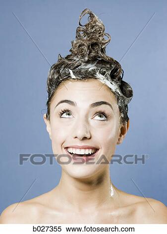 woman shampooing her hair View Large Photo Image Stock Photography - woman shampooing her hair. Fotosearch