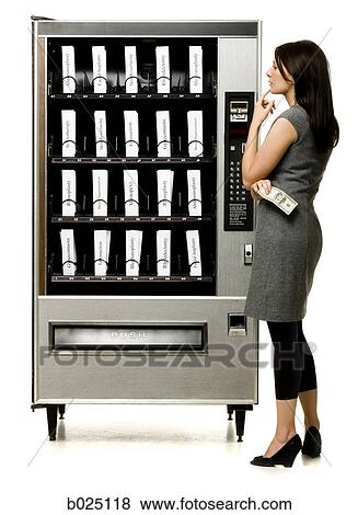 woman shopping for plastic surgery in a vending machine View Large Photo Image Stock Photo - woman shopping for plastic surgery in a vending machine. Fotosearch