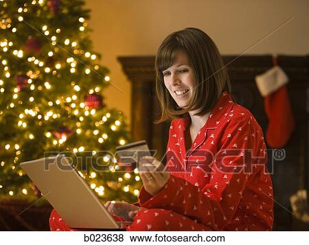 woman shopping online at christmas View Large Photo Image Stock Photo - woman shopping online at christmas. Fotosearch