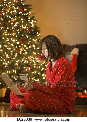 woman shopping online at christmas View Large Photo Image Stock Photo - woman shopping online at christmas. Fotosearch