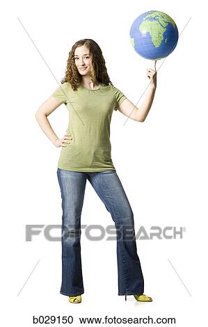 woman spinning a globe on her finger View Large Photo Image Stock Image - woman spinning a globe on her finger. Fotosearch