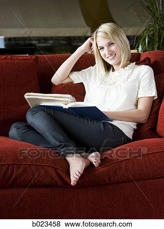 woman studying on the couch View Large Photo Image Stock Photo - woman studying on the couch. Fotosearch