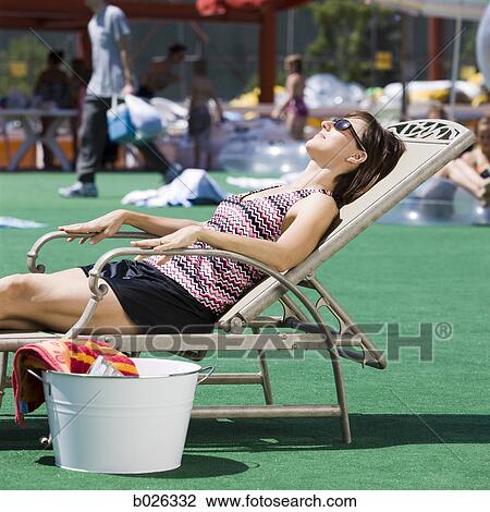 woman sunbathing View Large Photo Image Stock Image - woman sunbathing. Fotosearch