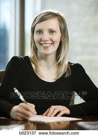 woman taking notes View Large Photo Image Stock Photo - woman taking notes. Fotosearch