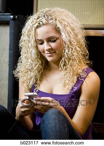 woman text messaging View Large Photo Image Stock Photo - woman text messaging. Fotosearch