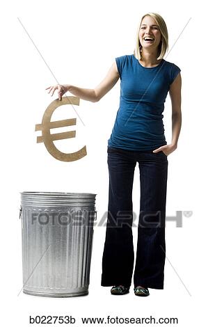 woman throwing euro symbol in the trash View Large Photo Image Stock Image - woman throwing euro symbol in the trash. Fotosearch