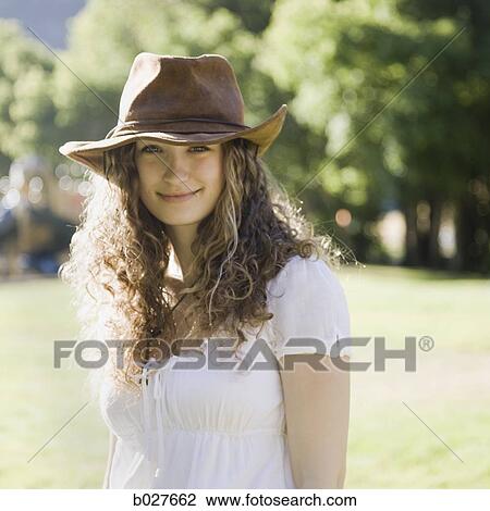 woman wearing a hat View Large Photo Image Stock Image - woman wearing a hat. Fotosearch