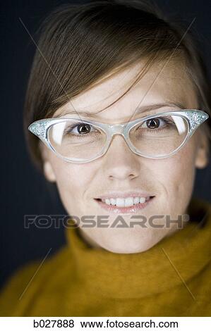 woman wearing vintage glasses View Large Photo Image Stock Photo - woman wearing vintage glasses. Fotosearch