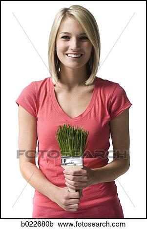 woman with a paint brush made of grass View Large Photo Image Stock Image - woman with a paint brush made of grass. Fotosearch