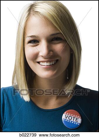 woman with a "vote" button View Large Photo Image Stock Photo - woman with a "vote" button. Fotosearch