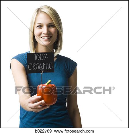 woman with an organic red pepper View Large Photo Image Stock Photo - woman with an organic red pepper. Fotosearch