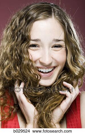 woman with curly hair View Large Photo Image Picture - woman with curly hair. Fotosearch