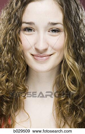 Stock Photo - woman with curly hair. Fotosearch