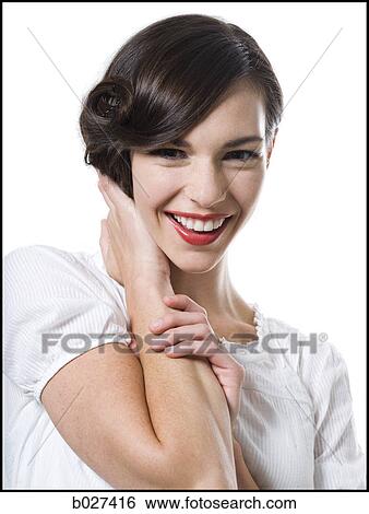 woman with her hair up in a classic hollywood hairstyle reminiscent of the 1940s View Large Photo Image Stock Photograph - woman with her hair up in a classic hollywood hairstyle reminiscent of the 1940s. Fotosearch