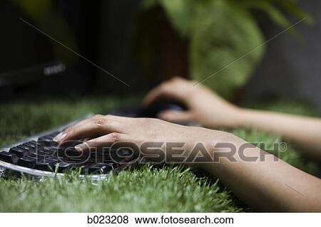 woman working in her "green" office View Large Photo Image Stock Photo - woman working in her "green" office. Fotosearch
