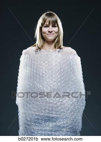 woman wrapped in bubble wrap View Large Photo Image Stock Image - woman wrapped in bubble wrap. Fotosearch