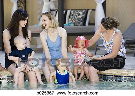 women by the pool with their babies View Large Photo Image Stock Photo - women by the pool with their babies. Fotosearch