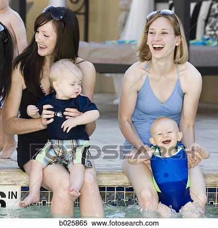 women by the pool with their babies View Large Photo Image Stock Photography - women by the pool with their babies. Fotosearch