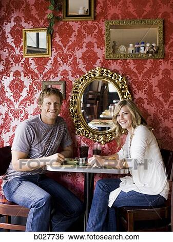 young couple eating together at a diner View Large Photo Image Stock Photograph - young couple eating together at a diner. Fotosearch