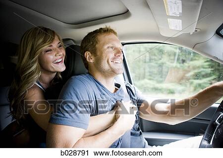 Stock Image - young couple on a road trip. Fotosearch
