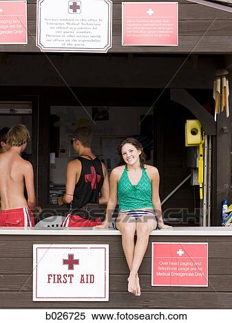young woman at a first aid station View Large Photo Image Stock Photography - young woman at a first aid station. Fotosearch