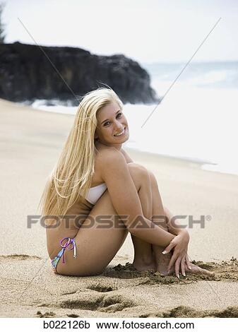 young woman at the beach View Large Photo Image Stock Image - young woman at the beach. Fotosearch