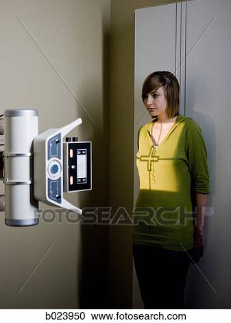 young woman having an x-ray taken View Large Photo Image Stock Image - young woman having an x-ray taken. Fotosearch