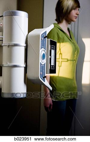 young woman having an x-ray taken View Large Photo Image Stock Image - young woman having an x-ray taken. Fotosearch