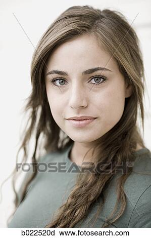 young woman looking at camera View Large Photo Image Stock Image - young woman looking at camera. Fotosearch