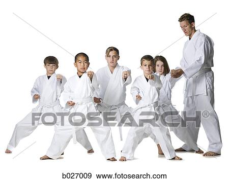 Stock Photo - youth practicing martial arts. Fotosearch