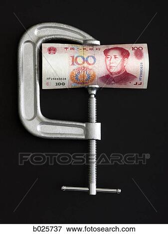 yuan in a clamp View Large Photo Image Stock Photo - yuan in a clamp. Fotosearch