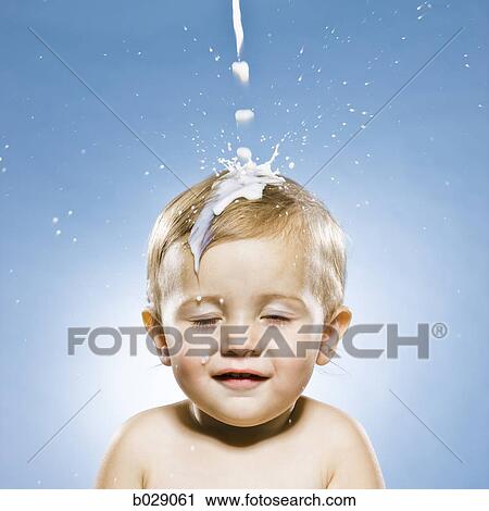 baby boy getting milk poured on his head View Large Photo Image Stock Image - baby boy getting milk poured on his head. Fotosearch