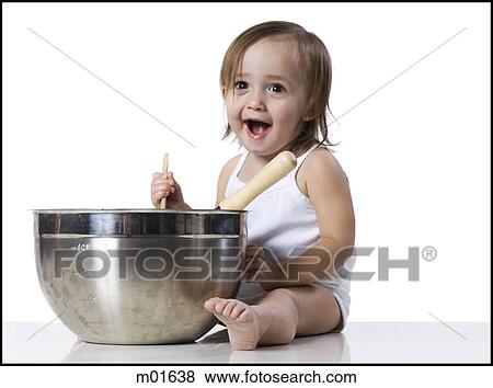 Stock Photo - baby girl and a mixing bowl. Fotosearch