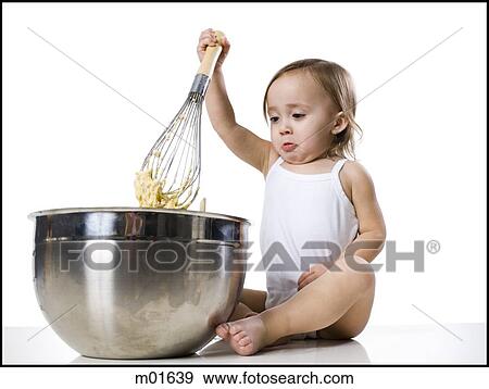 Stock Photo - baby girl and a mixing bowl. Fotosearch