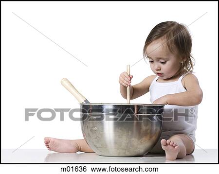 Stock Photograph - baby girl and a mixing bowl. Fotosearch