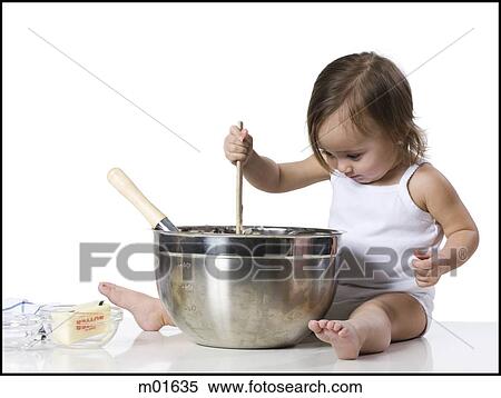 Stock Photography - baby girl and a mixing bowl. Fotosearch