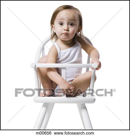 baby girl in a high chair View Large Photo Image Stock Photograph - baby girl in a high chair. Fotosearch