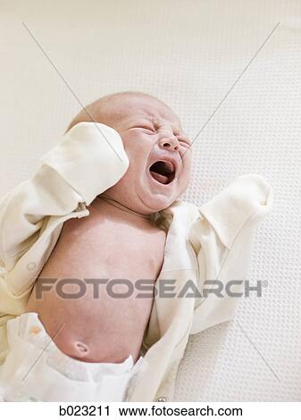 baby on a changing table View Large Photo Image Stock Image - baby on a changing table. Fotosearch