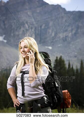 backpackers hiking through the wilderness View Large Photo Image Stock Image - backpackers hiking through the wilderness. Fotosearch